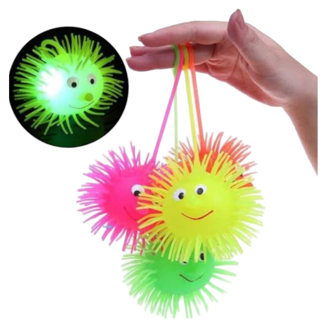 Pelotas Caritas con Luces